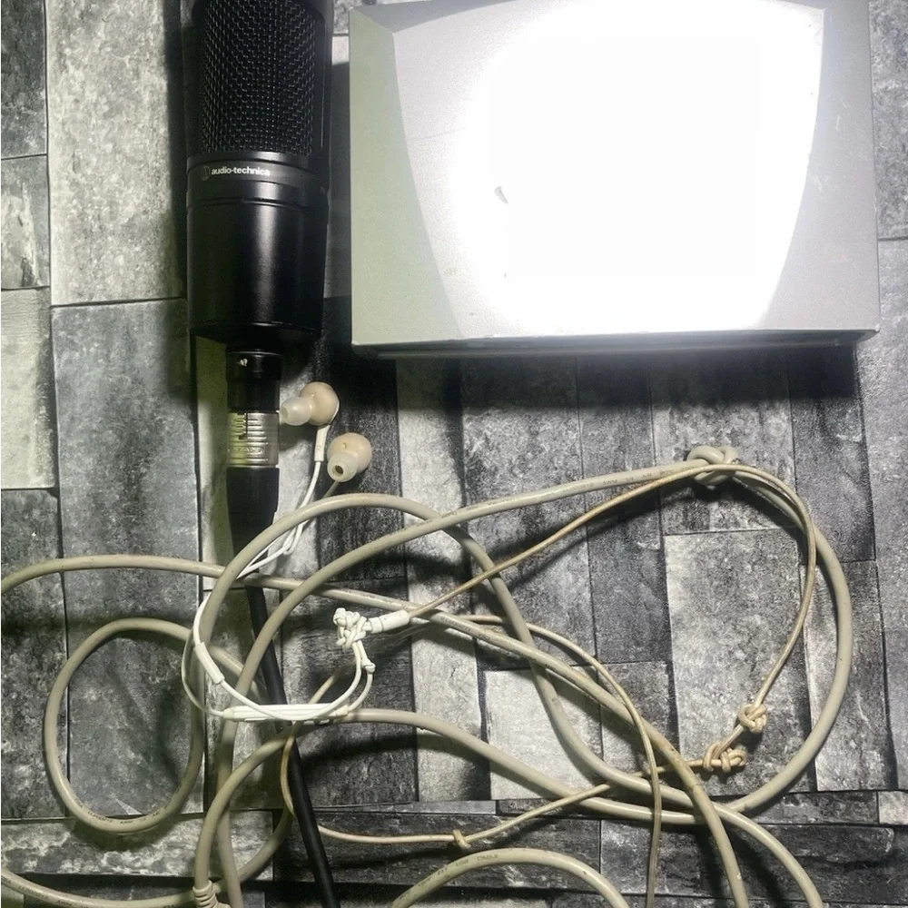 Audio Technica Black Microphone with Silver Accessory